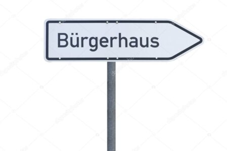 Wegweiser in einer deutschen Ortschaft als Symbolbild